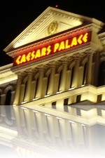 Caesars Palace nighttime over Lake Bellagio