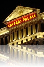 Caesars Palace nighttime over Lake Bellagio