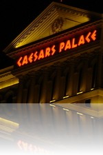 Caesars Palace nighttime over Lake Bellagio