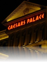 Caesars Palace nighttime over Lake Bellagio