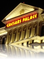 Caesars Palace nighttime over Lake Bellagio
