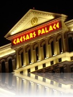 Caesars Palace nighttime over Lake Bellagio