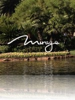 The Mirage Sign with the Casino in the background